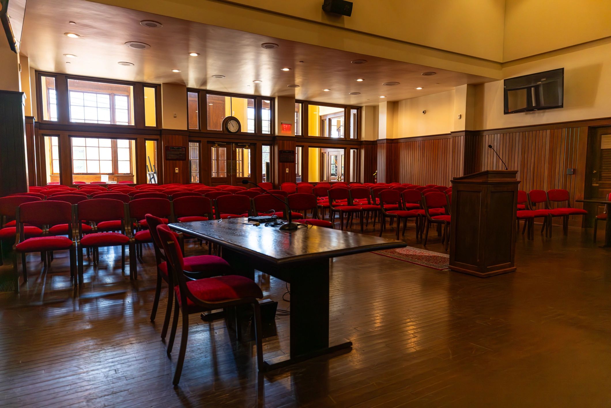 Empty courtroom interior with benches and judge’s bench